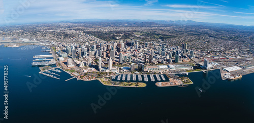 Aerial shot of the cityscape of downtown San Diego, California, surrounded by the ocean photo
