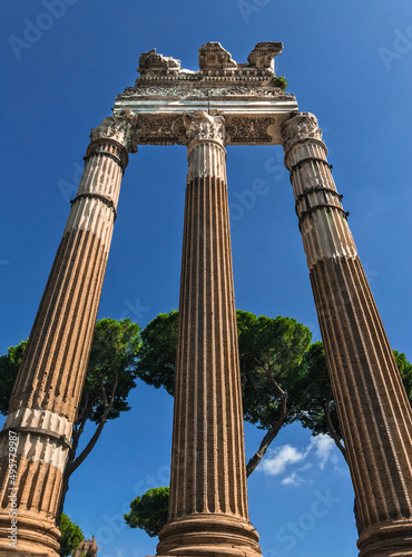 Vertical shot of the Temple of Venus Genetrix on blue sky background in Rome, Italy photo