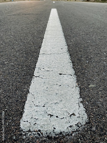 asphalt road with lines in perspective