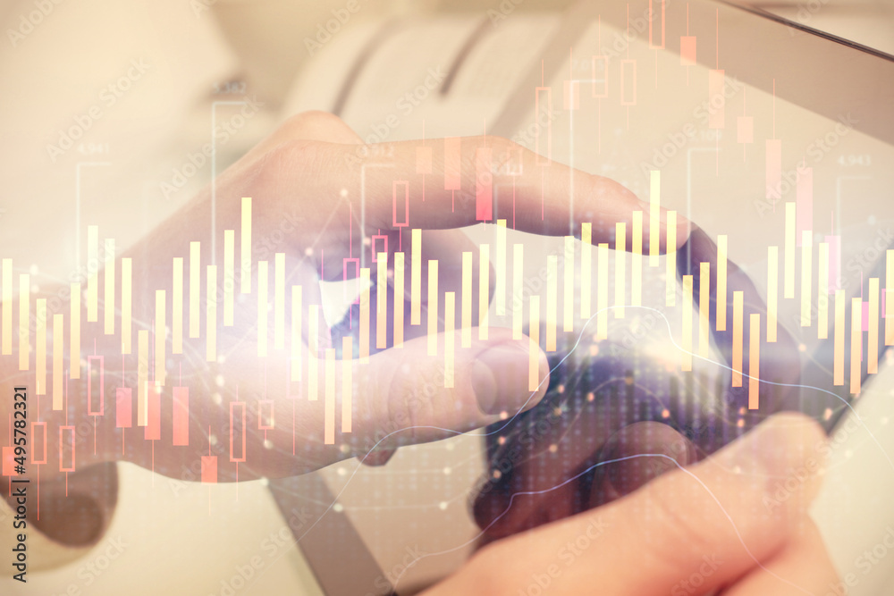 Multi exposure of man's hands holding and using a phone and financial chart drawing. Market analysis concept. Multi exposure of man's hands holding and using a phone and financial chart drawing. Market analysis concept.