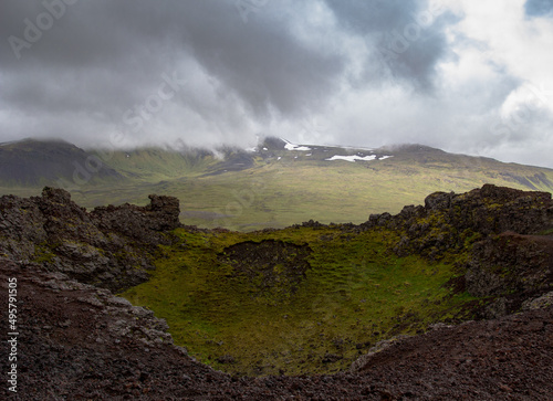 Shot of a crater on a cloudy day in Snaefellsjokull National Park, Iceland photo