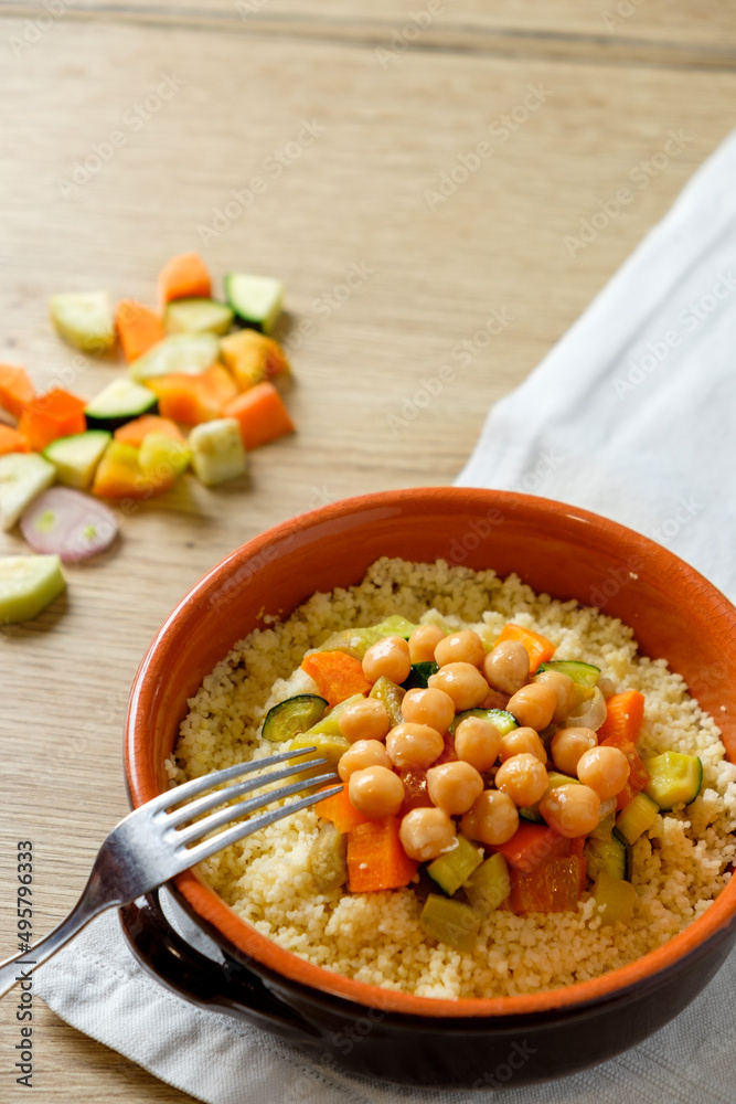 vegan cous cous vith chickpeas and vegetables, traditional dish of north africa vegan cous cous vith chickpeas and vegetables, traditional dish of north africa