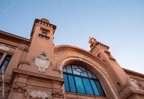Bari, facciata superiore con due torri, Teatro Margherita stile liberty, in origine galleggiante su palafitte mare, finestre delimitate da lesene con capitelli corinzi, cornici marcapiano photo