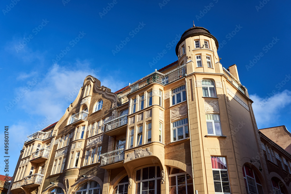 facade of historic tenement house in the city of Poznan