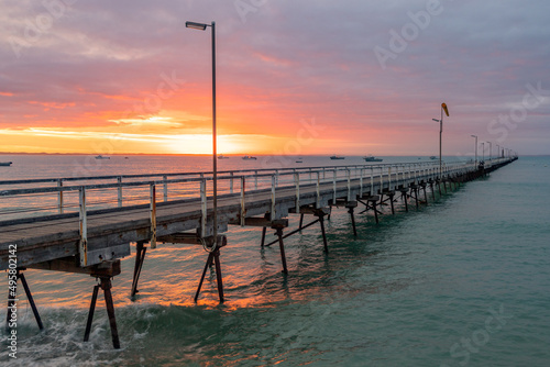 A glowing sunrise over the iconic Beachport Jetty located in the southeast of South Australia taken on February 20th 2022