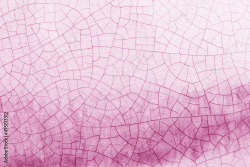 Pink and white crack ceramic tile. Winter color of glazed tile texture abstract background.