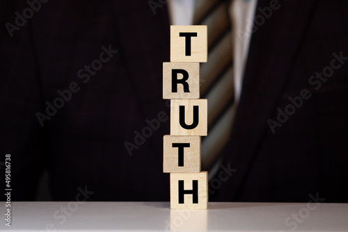 Canvastavla Truth - word from wooden blocks with letters, real facts truth concept, white ba