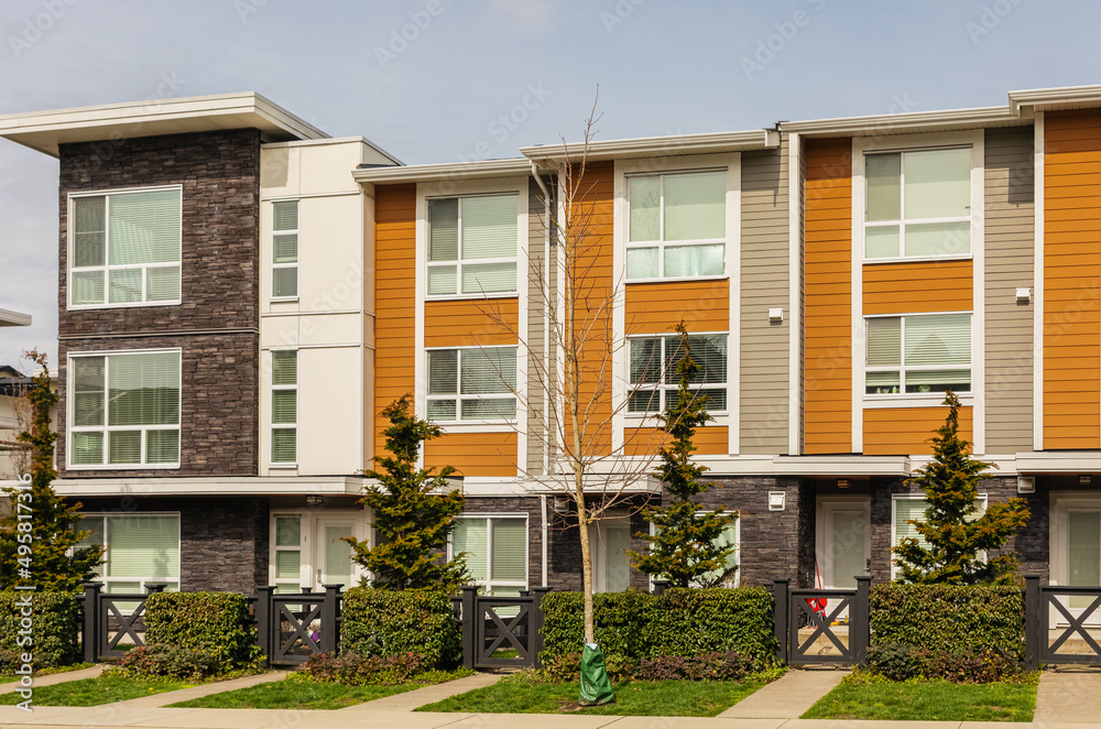 Brand new apartment building in BC, Canada. Canadian modern residential architecture, exterior Brand new apartment building in BC, Canada. Canadian modern residential architecture, exterior