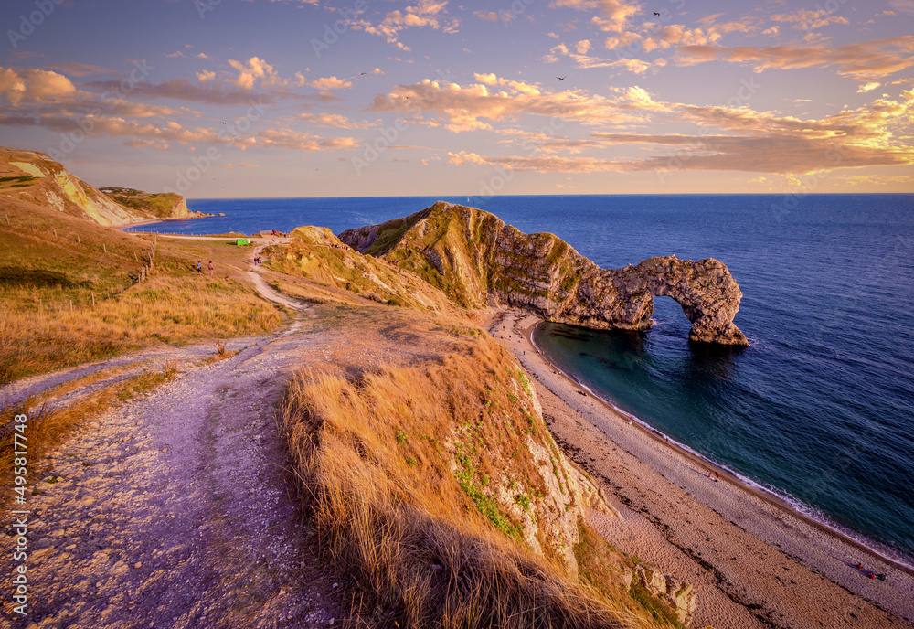 Famous Durdle Door in England at sunset - travel photography