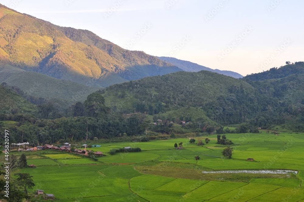 Mountain range scenery and rice fields at Ban Sapan village, Small village in Nan province, THAILAND.