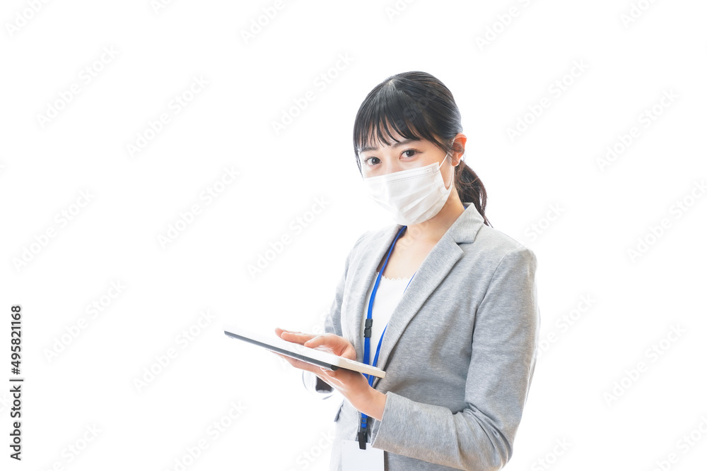 マスクをしてキーボードを持つ若いビジネスパーソン マスクをしてキーボードを持つ若いビジネスパーソン