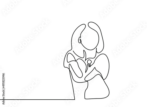 a woman with arms sits down and gives an interview on the air