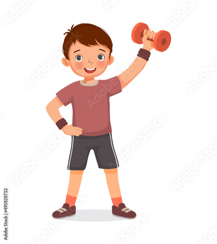 Healthy cute little boy doing sport exercises fitness workout with dumbbells