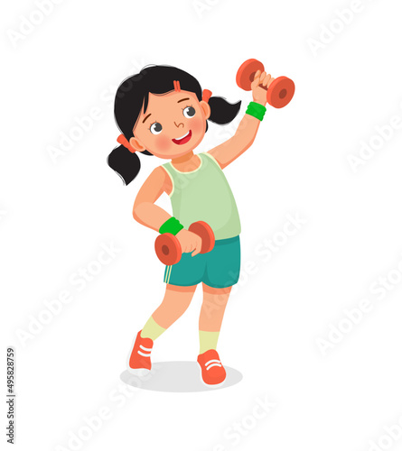 Healthy cute little girl doing sport exercises fitness workout with dumbbells