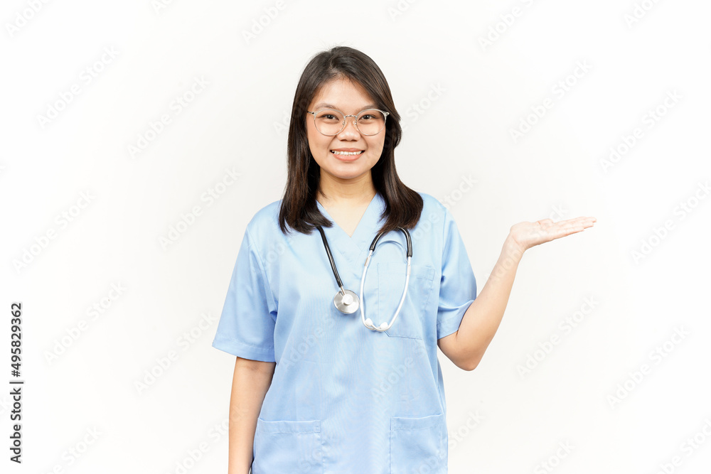 Showing and Presenting Product on Open Palm Of Asian Young Doctor Isolated On White Background Showing and Presenting Product on Open Palm Of Asian Young Doctor Isolated On White Background