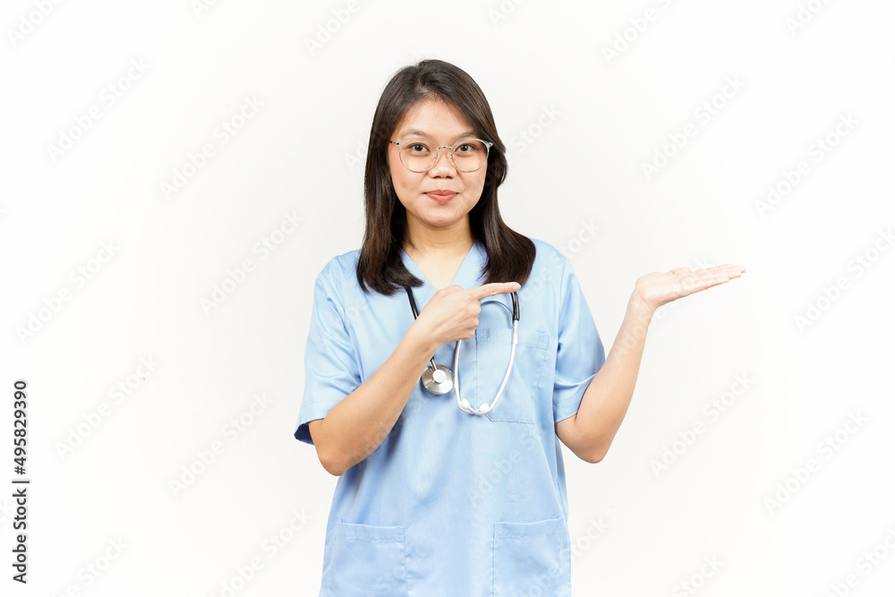 Showing and Presenting Product on Open Palm Of Asian Young Doctor Isolated On White Background Showing and Presenting Product on Open Palm Of Asian Young Doctor Isolated On White Background