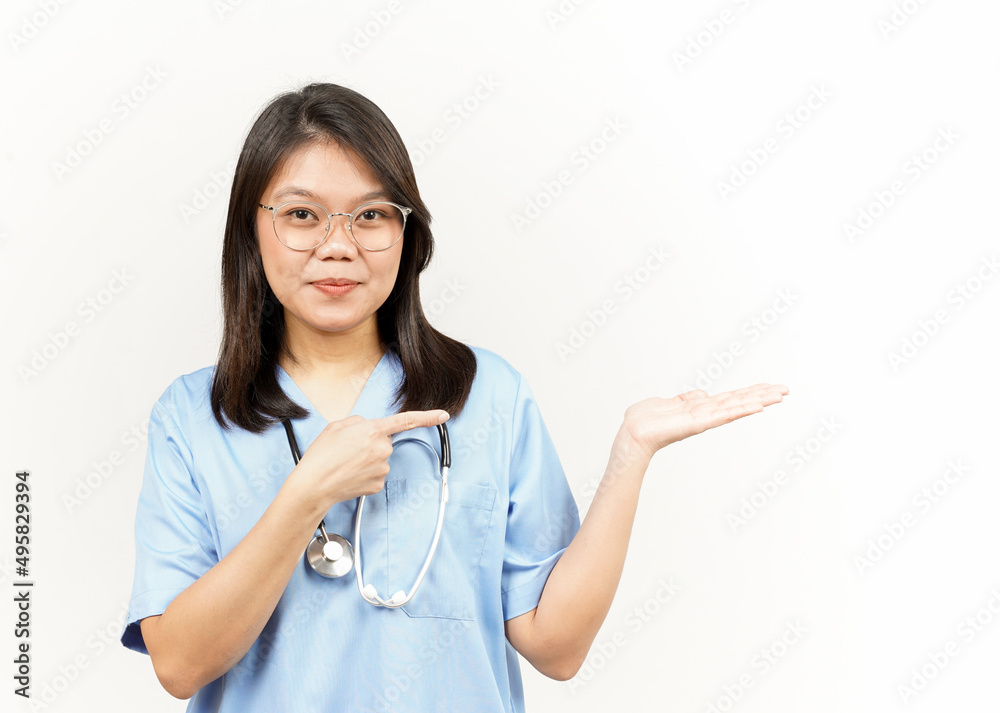 Showing and Presenting Product on Open Palm Of Asian Young Doctor Isolated On White Background Showing and Presenting Product on Open Palm Of Asian Young Doctor Isolated On White Background
