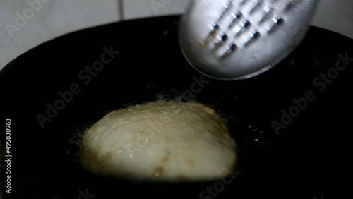 Cooking of Tasty Indian Kachori. Hot and Fresh Food photo