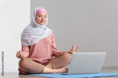 Pregnant Muslim woman with ...