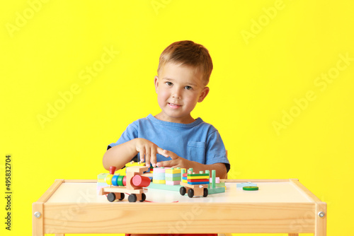 Cute little boy playing wit...