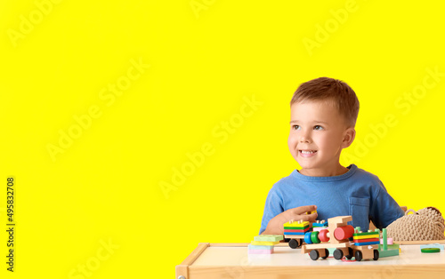 Cute little boy playing wit...