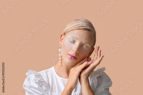 Beautiful young woman with ...