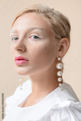 Beautiful young woman with ...