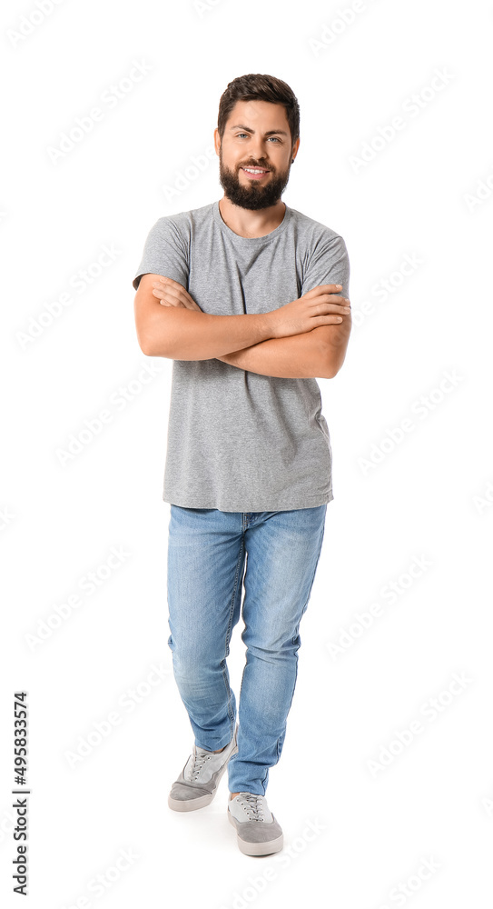 Handsome man in grey t-shirt on white background Handsome man in grey t-shirt on white background