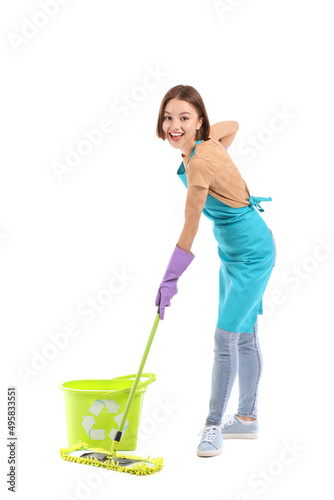 Beautiful young woman with floor mop on white background