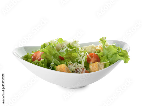 Plate of tasty vegan Caesar salad isolated on white background