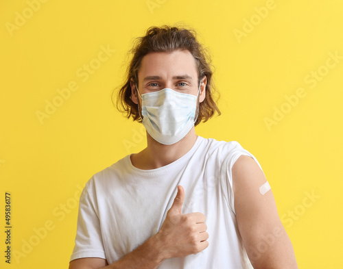 Young man in medical mask a...