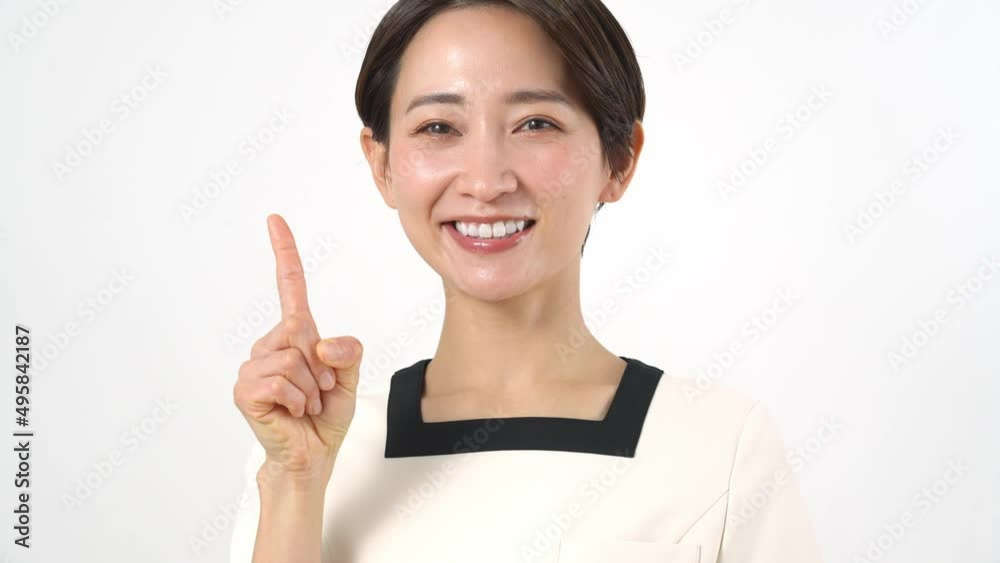指さしをする日本人女性 指さしをする日本人女性