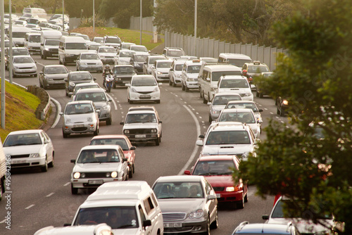 Traffic, the last thing you need after work. Shot of a cars traveling in heavy traffic on the way home from work.