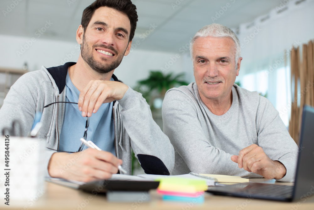 adult son with senior father at home accounting adult son with senior father at home accounting