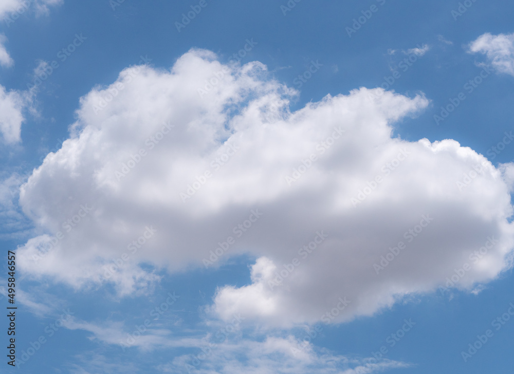 White fluffy cloud on the blue sky background White fluffy cloud on the blue sky background
