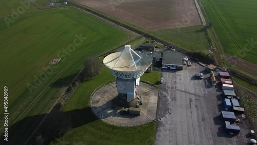 Top down aerial birds eye view shot of observatory with radar antenna photo