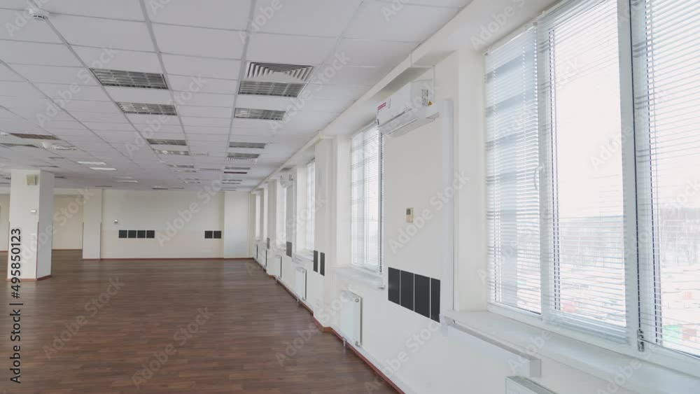 Empty office space interior with panoramic windows, a walk through the office space, decoration, inside a skyscraper. Empty office space interior with panoramic windows, a walk through the office space, decoration, inside a skyscraper.