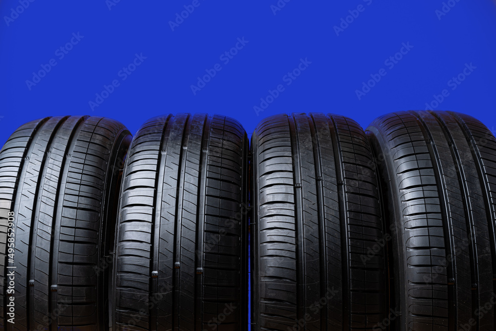 Group of tires on a blue background Group of tires on a blue background