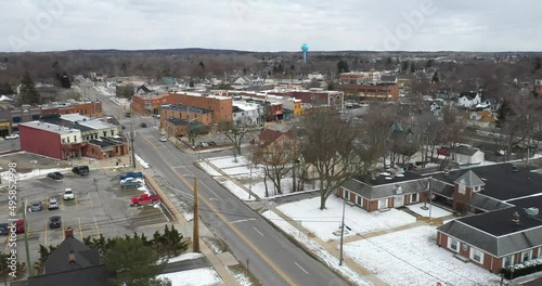 Oxford, Michigan neighborhood and downtown view from drone moving forward. photo