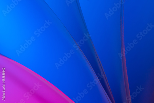 colorful abstract wallpaper texture. background macro of origami pattern made of curved sheets of paper.
