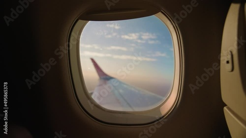 Airplane window frame during flying photo