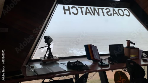 Coast guard observation tower interior overlooking the beach and sea. photo