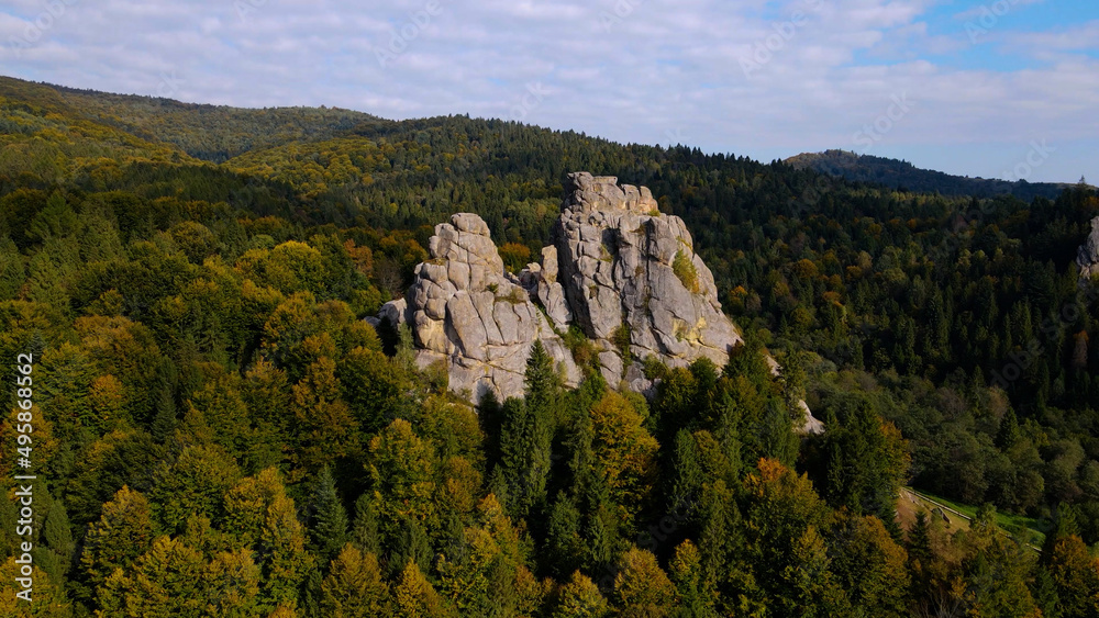 Aerial drone view of famous Tustan fortress. Ukrainian medieval cliff-side monument in national park