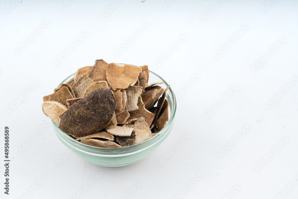 Satntra chilka Dry - Dry Orange peel over isolated white background closeup (Creative use) Satntra chilka Dry - Dry Orange peel over isolated white background closeup (Creative use)