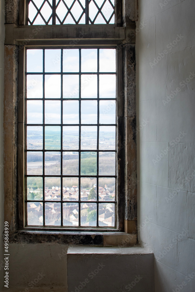 Looking out of a window at Bolsover Castle in Derbyshire, UK