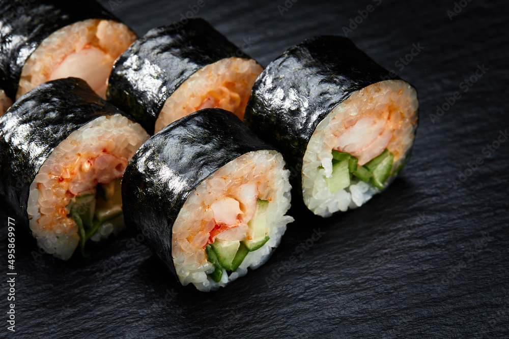 Sushi rolls, traditional Japanese food rice, nori and seafood, menu