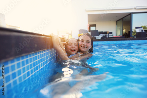 girlfriends friends have fun in the pool on a summer summer holiday day