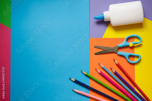 Obraz na plátne preschool art lesson background with copy space - colorful paper, pencils, glue