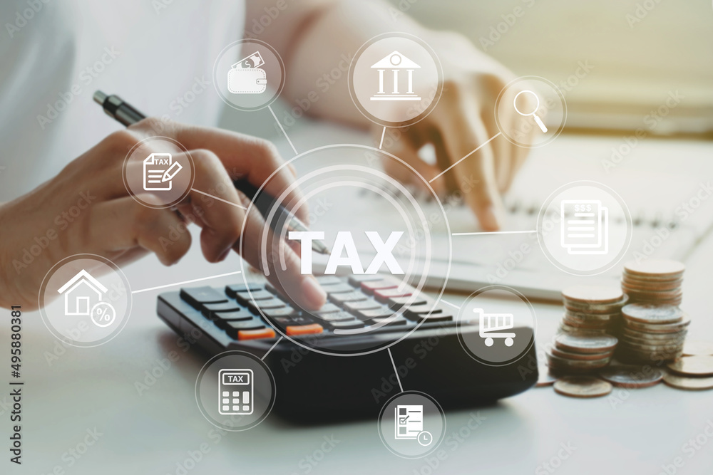 women using calculator calculated individual income tax for pay taxes annual.Financial research,government taxes and calculation tax return concept. Tax and Vat concept. - obrazy, fototapety, plakaty 