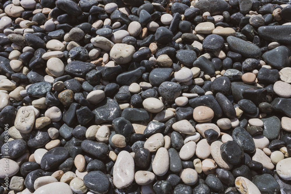 Texture of gray and white beach stones and pebbles Texture of gray and white beach stones and pebbles